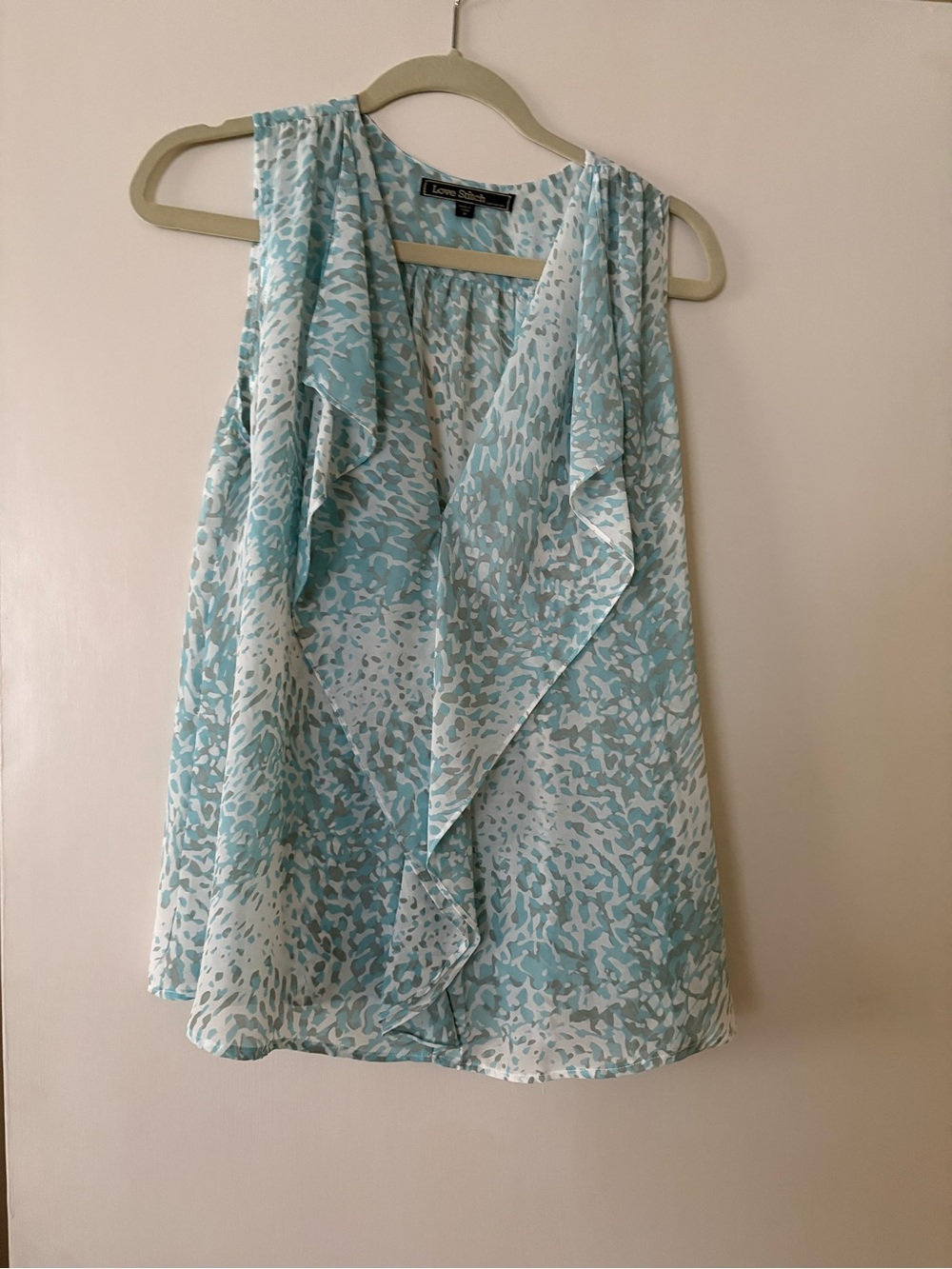 Love...Ady Blue Printed Ruffle Front Sleeveless Top